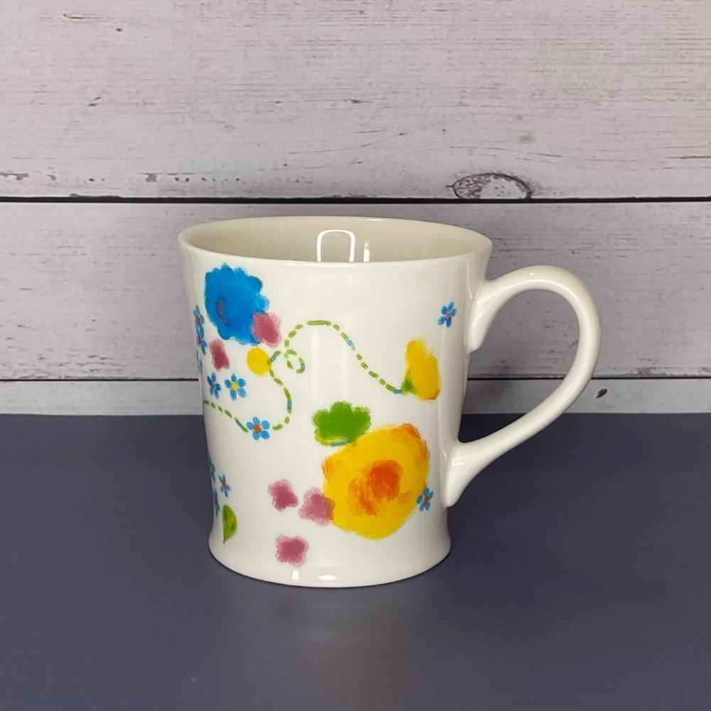 2006 Starbucks White Ceramic Coffee Mug w/Blue Yellow & Pink Flowers, 10 oz